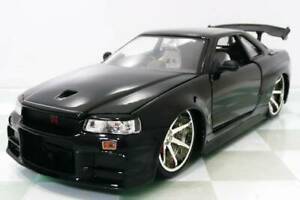 【送料無料】模型車 モデルカー エタットヌフジェイダスカイラインノワールetat neuf jada 124 nissan skyline r34 noir 103