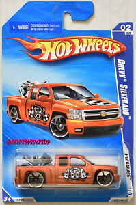 【送料無料】模型車 モデルカー ホットホイールガレージシェビーシルバラードオレンジhot wheels 2010 hw garage chevy silverado orange｜hokushin