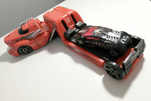 【送料無料】模型車 モデルカー ゾルティックカーホットホイールトランスポーターエージェントhot wheels transporter agent v12 with zoltic car 2004 great condition｜hokushin