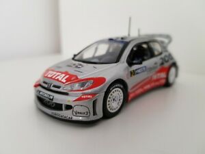 【送料無料】模型車 モデルカー プジョーラリーフィンランドラリーペンミブpeugeot 206 wrc 143 rally finland rally 2002 nib mib