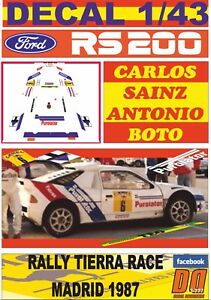 【送料無料】模型車 モデルカー デカールフォードカルロスサインツランドレースマディドdecal 143 ford rs200 carlos sainz r land race madid 1987 winner 01