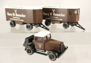 【送料無料】模型車 モデルカー ウィッキングハノマグハマッチャーベルリントレーラーwiking hanomag st 100 hamacher berlin with 2 furniture trailers 187h0 0851 01