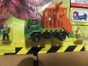 送料無料 模型車 モデルカー マッチボックスジュラシックパークトラッカートラッパースキップトラック Meter Erdarbeiten De