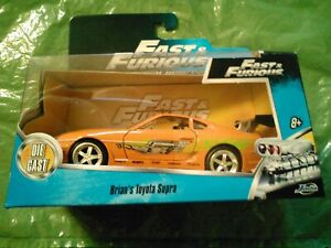 【送料無料】模型車 モデルカー ジェイダファストブライアンオレンジトヨタスープラ2017 jada fast amp; furious brians orange toyota supra