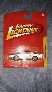 【送料無料】模型車 モデルカー ジョニーライトニングポンティアックjohnny lightning jl7 1984 pontiac firebird