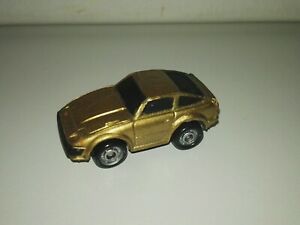 【送料無料】模型車 モデルカー マイクロマシンダットサンゴールドカラーファンライズmicro machines funrise 1989 datsun 240z gold color very rare