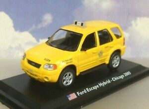 【送料無料】模型車 モデルカー タクシーデュモンドメタルフォードエスケープタクシーシカゴtaxis du monde metal 143 ford escape taxi chicago usa 2005 in yellow画像