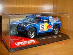 【送料無料】模型車 モデルカー フォルクスワーゲントゥアレグカルロスサインツシュルツダカールvolkswagen touareg carlos sainzschulz 143 dakar 2006｜hokushin