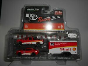 【送料無料】模型車 モデルカー チームシェルシボレーカマロシルバラードグリーンライトteam shell chevrolet camaro ss silverado enclosed car hauler greenlight 164