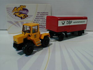 【送料無料】模型車 モデルカー ブレキナメルセデスベンツトラックイエローレッドトレーラーbrekina 13713 mercedesbenz trac with trailer dbp in yellowred 187