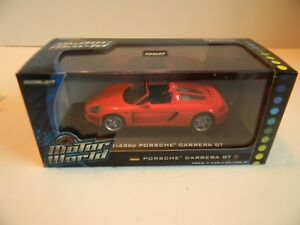 【送料無料】模型車 モデルカー グリーンライトモーターワールドポルシェカレラレッドgreenlight motor world 86010 143 porsche carrera gt red 2009 *nib*