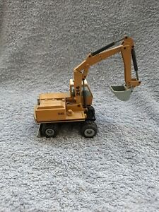 【送料無料】模型車 モデルカー トラヴォーパブリックズペレプヌーマティックツェッペリンドイツnzg travaux publics pelle pneumatique zeppelin 214 150 n2812 germany|hokushin