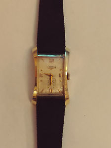 【送料無料】vintage 1950s solid 14k rare hourglass model longines serviced and running