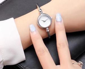 【送料無料】elegant women metal bracelet wristwatch gold amp; silver strap simple casual quartz|hokushin