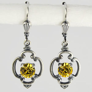 【送料無料】ピアス　ピアス　スワロフスキーヴィンテージレトロライトトパーズgrevenkmper ohrringe swarovski kristall rund vintage retro gelb light topaz
