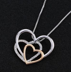 【送料無料】ネックレス クランプトリプルペンダントシルバーハートゴールデンcollier, pendentif triple coeur argent et dor avec strass blanc