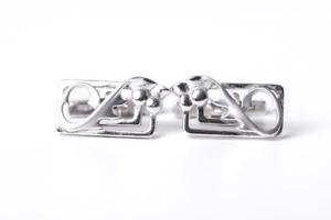 【送料無料】メンズアクセサリ―　シスルソリッドスターリングシルバーカフスボタンスコットランドrectangular twisting thistle solid sterling silver cufflinks made in scotland