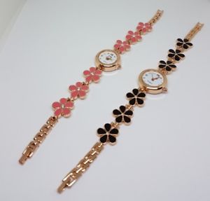 【送料無料】腕時計　ウォッチ　クリスマスデイジーフラワーレディースクォーツアナログゲームreloj de pulsera juego de regalo de navidad mujer de flor de la margarita analgico cuarzo par 12,565円