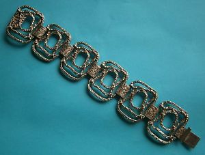 【送料無料】ブレスレット　アクセサリ―　ビンテージシルバートーンモダニストブレスレットエンボスa807 a vintage filigree silver tone embossed abstract modernist bracelet
