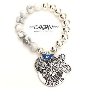 【送料無料】ブレスレット　アクセサリ―　セントクリストファーベネディクトクロスチャームブレスレットsaint christopher benedict evil eye bracelet with 5 way travelers cross charm