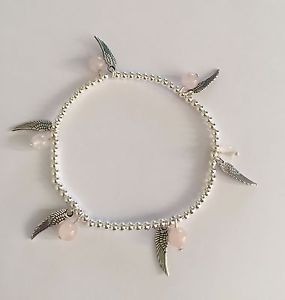 【送料無料】ブレスレット アクセサリ― スターリングシルバーローズクォーツビーズストレッチブレスレットsterling silver stretch bracelet with real rose quartz beads amp; angel wing charms