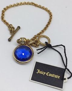 【送料無料】ブレスレット　アクセサリ―　クチュールブレスレットトグル juicy couture gold tone chain blue gem skull charm bracelet toggle clasp