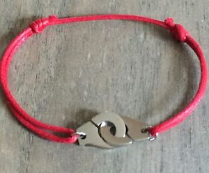 【送料無料】ブレスレット　アクセサリ&mdash;　コットンコードシルバースチールブレスレットthe current bracelet handcuffs on cotton cord adjustable red silver steel｜hokushin