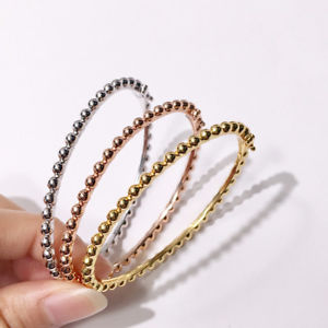 【送料無料】ブレスレット　アクセサリ―　パールブレスレットタフビジネス18kフィンtrt10bracelet tough business pearl metal plated or 18k fin trt10
