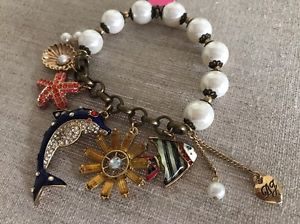 【貨物輸送無料】腕輪 付属品― ジョンソンシースターシェルドルフィンパールブレスレットnwt 100 betsey johnson sea star shell dolphin fish pearl bracelet