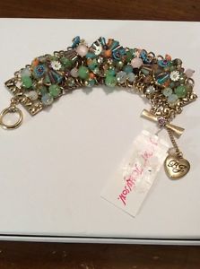【送料無料】ブレスレット　アクセサリ―　ジョンソンビーズフラワートグルブレスレットbetsey johnson weave amp; sew woven multicolor bead amp; flower toggle bracelet w8