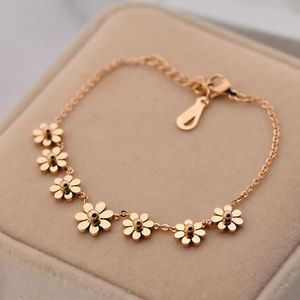 【送料無料】ブレスレット　アクセサリ―　ステンレス14k7ヒナギクwomensチェーンジュエリーstainless steel 14k rose gold seven daisy charms womens chain bracelet jewelry