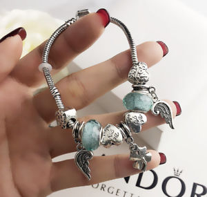 【送料無料】ブレスレット アクセサリ― ステンレススチールペンダントブレスレット womens stainless steel resemble pando wings of angels pendant bracelet