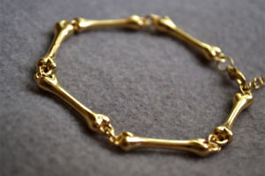 【送料無料】ブレスレット　アクセサリ―　デスケルトンハロウィーンas de38054 goldene skeleton schadel handknochen halloween deauen zink legierung
