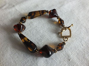 【送料無料】ブレスレット　アクセサリ―　クラスプブレスレットゴールドトーンオレンジブラウンビーズニースbeautiful clasp bracelet gold tone amber brown beads 12w 714 long nice
