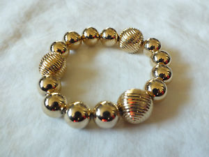 【送料無料】ブレスレット　アクセサリ―　ストレッチブレスレットゴールドトーンビーズワイドワウcollectible stretch bracelet gold tone smooth textured beads 58 wide wow