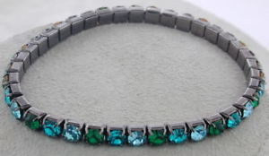【送料無料】ブレスレット アクセサリ― ムーティelastic silvertone bracelet with muticolored stones