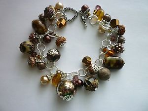 【送料無料】ブレスレット　アクセサリ―　* ブレスレットブラウンゴールド*silver tone charm bracelet brownsgolds crystals