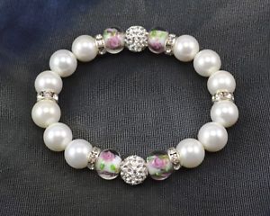 【送料無料】ブレスレット　アクセサリ―　ホワイトパールクリスタルローズラバーブレスレットexclusive 10mm white pearl amp; 68 crystal paved shamballa rose elastic bracelet 18