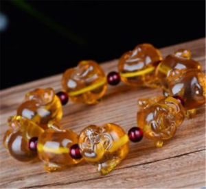 【送料無料】ブレスレット アクセサリ― バルトオレンジビーズブレスレットbaltic amber amber doublesided buddha head beads men and women bracelet