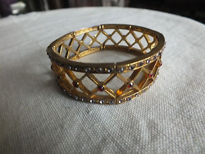 【送料無料】ブレスレット　アクセサリ―　ストレッチブレスレットゴールドトーンクリアワウbeautiful stretch bracelet gold tone openwork clear red rhinestones 34 w wow