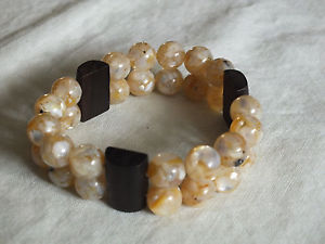 【送料無料】ブレスレット　アクセサリ―　ブレスレットベージュ1インチnicebeautiful stretch bracelet dark brown beige marbled beads 1 inch wide nice