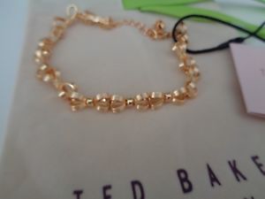 【貨物輸送無料】イタリアン 腕輪 ロットテッドベーカーバッグステープルlotto n ted baker collegato fiocco dorato bracciale con sacchetto regalo