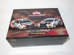【送料無料】模型車　スポーツカー　ランサーエボアラウージョラリーポルトガルフランスセット143 mitsubishi lancer evo ix amp; x araujo rally portugal 2009 amp; france 2010 set 18,446円
