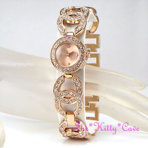 【送料無料】腕時計　レディースローズゴールドデザイナーダブルウォッチスワロフスキークリスタルキスladies rose gold pl designer dress double kiss bling watch w swarovski crystals