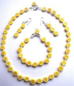 【送料無料】アクセサリー　ネックレス　レモンハンドネックレスブレスレットイヤリングセットスワロフスキーcollana con limone fatto a mano bracciale e orecchini set realizzato con cristalli swarovs
