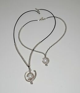 【送料無料】アクセサリー　ネックレス　ハンドメイドネックレスカップルun paio del collana di perlacollar del cuerouno di 50 favoritos fatto a mano 21,158円