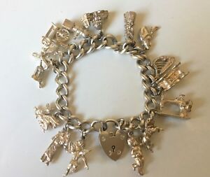 【送料無料】ネックレス　ビンテージソリッドスターリングシルバーヘビーブレスレットｇvintage solid sterling silver heavy 15 charms cars, witch, people bracelet 66g