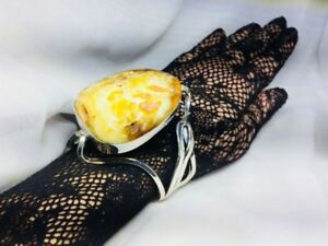 【送料無料】ネックレス　バルトスターリング925a modern large turned bracelet with a stone of baltic amber sterling silver 925