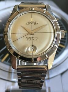 【送料無料】　腕時計　ビンテージシグマシータイガージュエルステンレスダイバーウォッチvintage sigma sea tiger 21 jewel stainless date diver watch wow｜hokushin