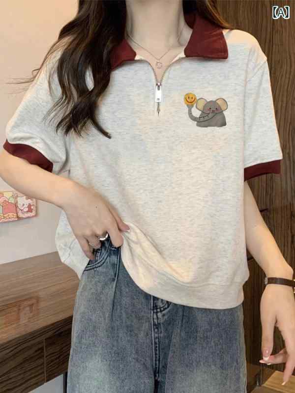 Tシャツ シャツ シンプル の 象 柄 プリントの ゆったり 肩の 半袖 Tシャツ。 女性用。 夏用。 スタイリッシュで 年齢を 感じさせにくい ファッション。 ポロ ショート トップ。